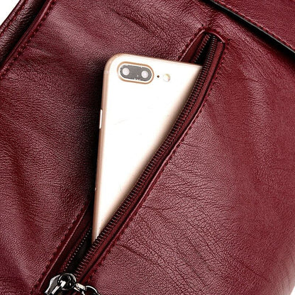 Elegant Burgundy Leather Handbag with Silver Accents